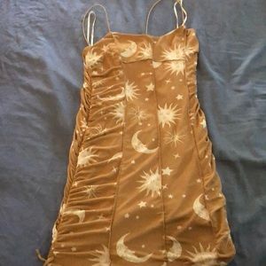 Forever 21 strap dress with suns and and moons on it